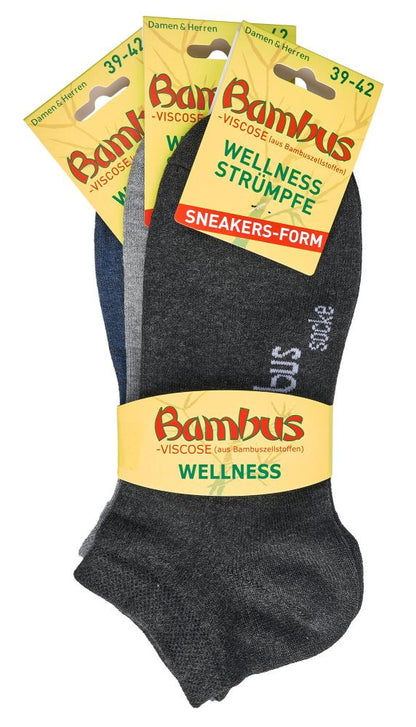 3-15 Paar Bambus Viskose Sneaker Socken in Grau, Verpackung zeigt drei Paar Wellness-Strumpfe in Sneakers-Form mit gelbem Banderole und Bambus-Branding