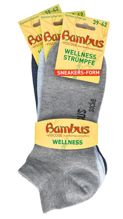 3-15 Paar Bambus Viskose Sneaker Socken in Melange-Grautönen, Verpackung zeigt drei Paar Wellness-Strümpfe in Sneakers-Form für Damen und Herren, Größe 39-42, mit gelber Banderole