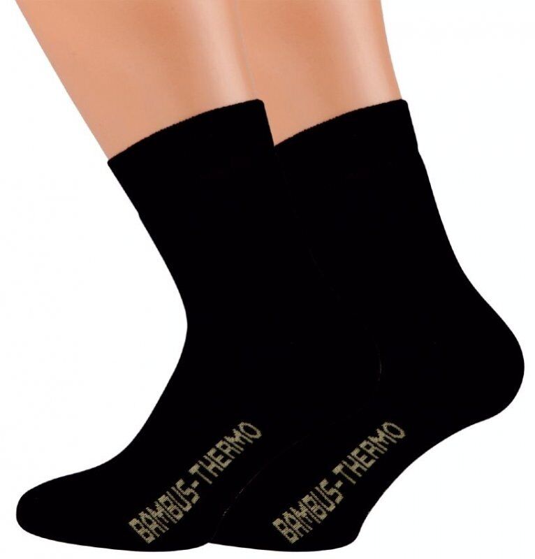 2-10 Paar warme Winter THERMO Bambus Viskose Socken Unisex - Schwarze Thermosocken aus Bambusviskose mit goldener Aufschrift, photographiert an einem Sockendisplay, zeigen elegante und komfortable Passform