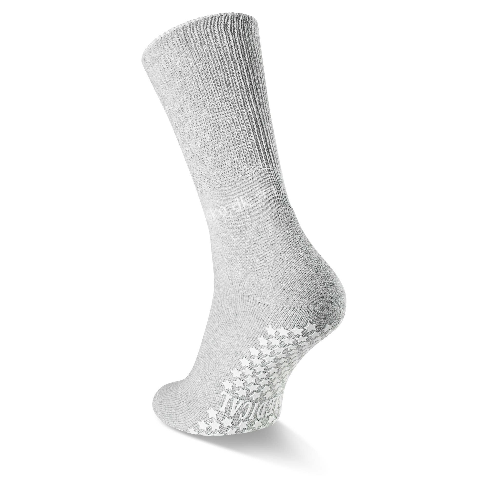 Auf dem Bild siehst du die ABS Socke mit Fokus auf der Sohle. Weiße Sternchen auf grauer Socke.