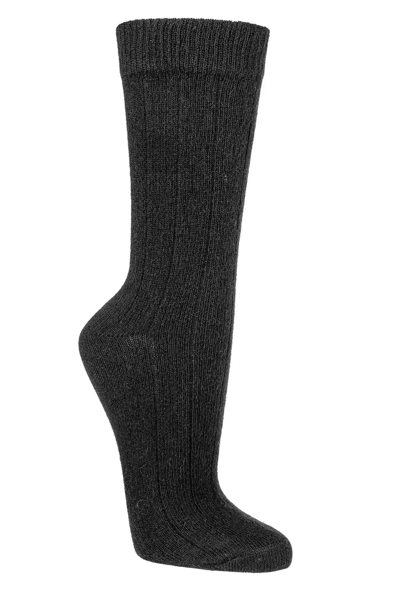 Socken mit Merinowolle und Kaschmir in schwarz am Fuß getragen, weiche Ripp Struktur, Unisex